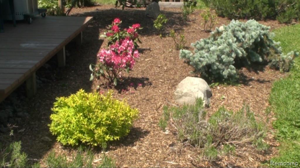 2136 Granger Road Oxford, MI 48371 - Photo 77 of 95 landscaping side deck.jpg