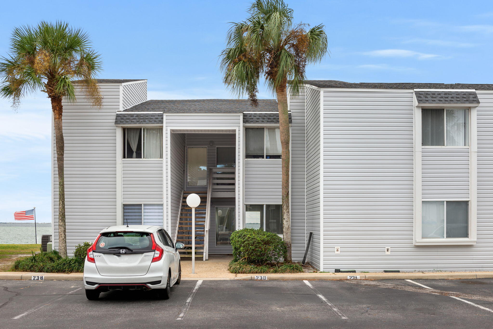 101 Old Ferry Road, Unit 23A Shalimar, FL 32579 - Photo 1 of 26 a white house with a outdoor space