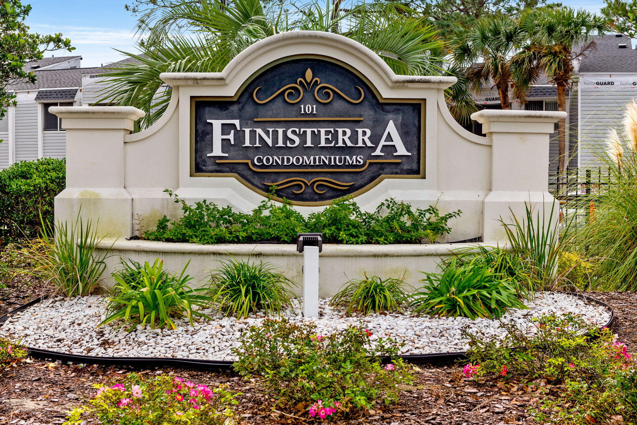 101 Old Ferry Road, Unit 23A Shalimar, FL 32579 - Photo 8 of 26 a view of sign board with flower