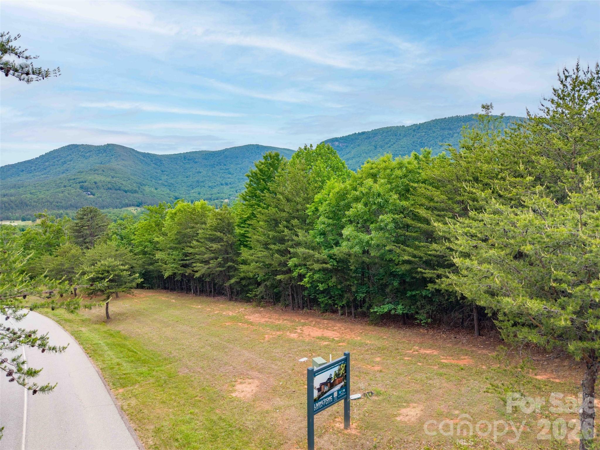 38 West Deep Gap Farm Road, Unit 38 Mill Spring, NC 28756 - Photo 5 of 20 a view of a lake with a yard