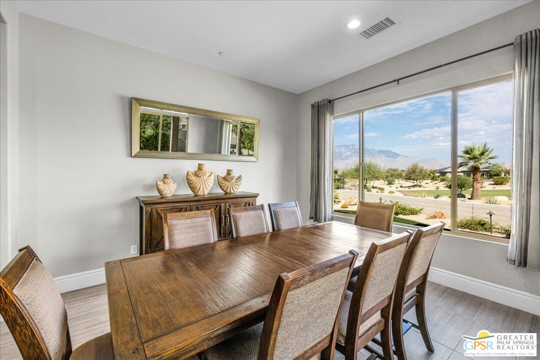 82 Cabernet Rancho Mirage, CA 92270 - Photo 9 of 25 a view of a dining room with furniture window and outside view