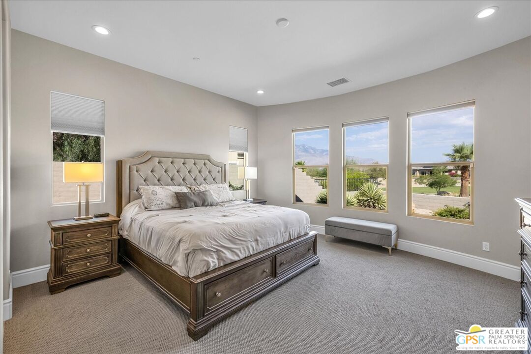 82 Cabernet Rancho Mirage, CA 92270 - Photo 10 of 25 a spacious bedroom with a bed and window