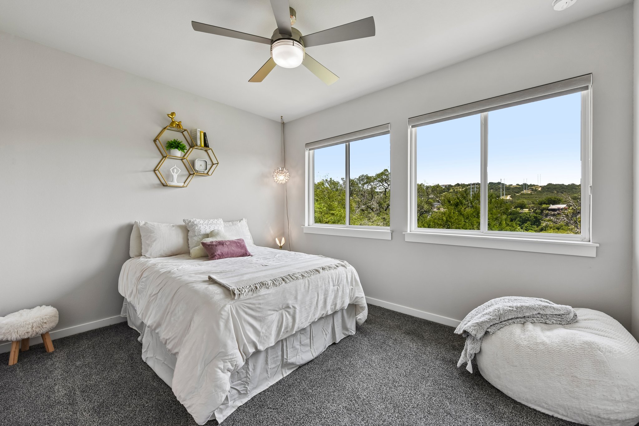 2203 Improver Road Spicewood, TX 78669 - Photo 22 of 38 A quiet retreat with elevated views and ample light.