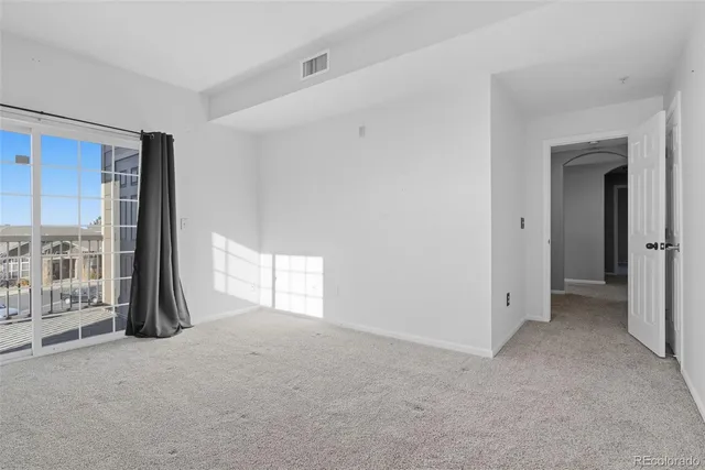 wooden floor and windows in an empty room