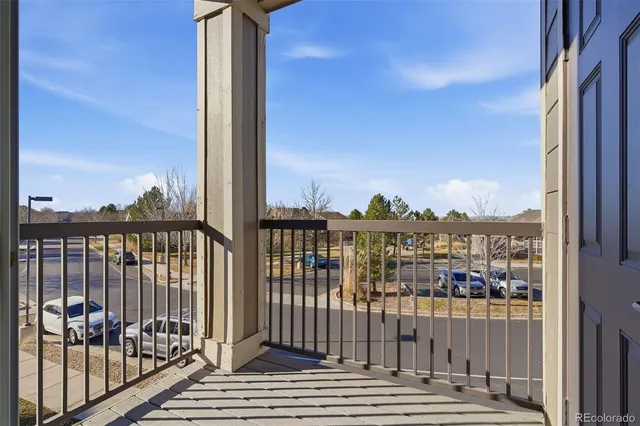 a view of a balcony with city view
