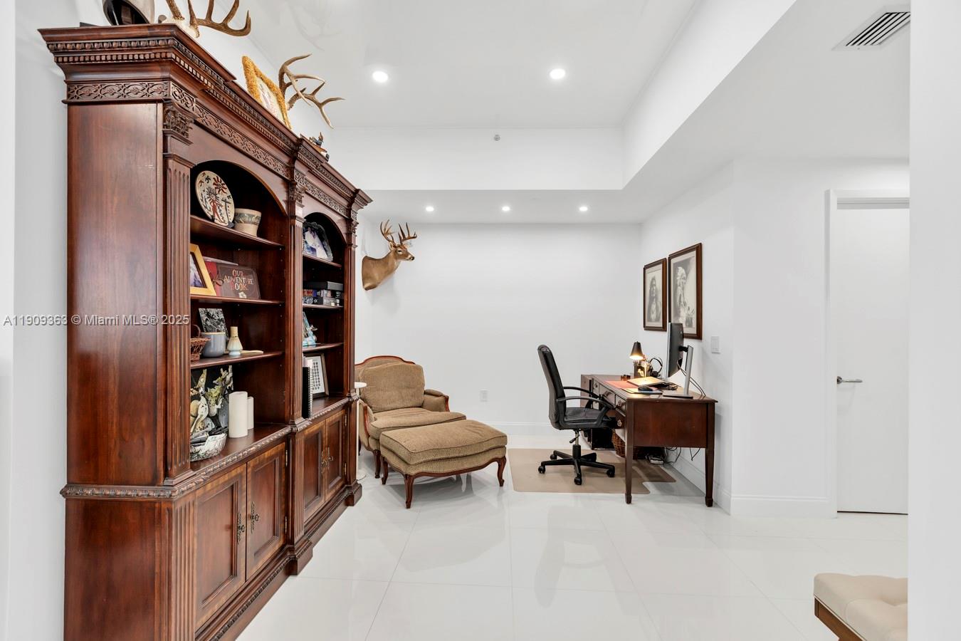 3131 Northeast 188th Street, Unit 21004 Aventura, FL 33180 - Photo 16 of 53 a living room with furniture
