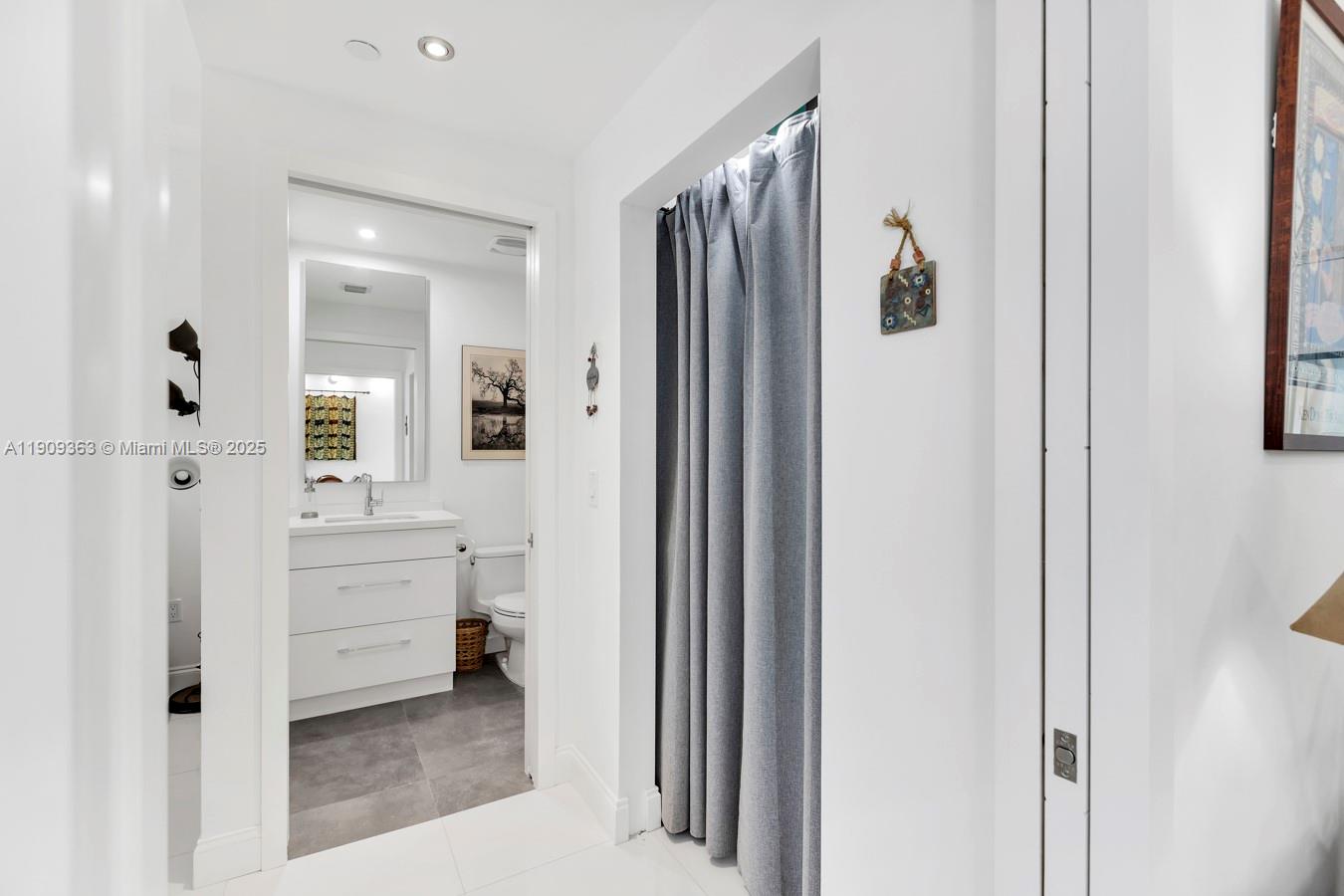 3131 Northeast 188th Street, Unit 21004 Aventura, FL 33180 - Photo 17 of 53 a bathroom with a shower and a sink