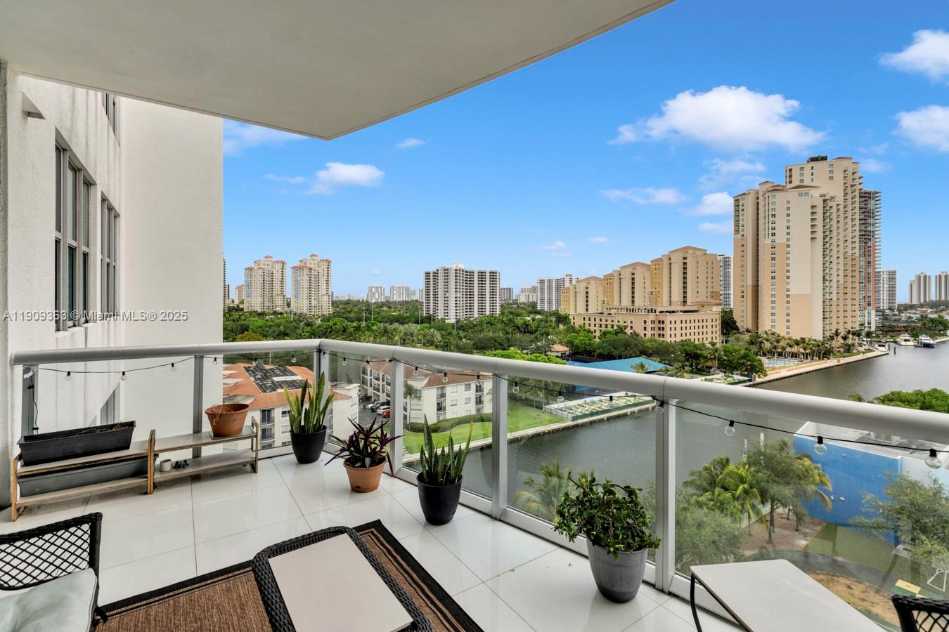 3131 Northeast 188th Street, Unit 21004 Aventura, FL 33180 - Photo 3 of 53 a view of city from balcony