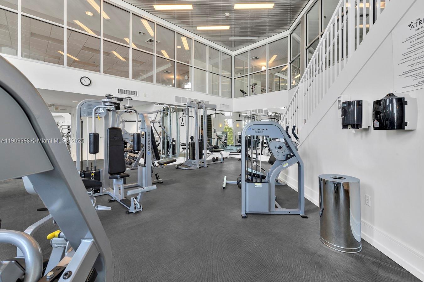 3131 Northeast 188th Street, Unit 21004 Aventura, FL 33180 - Photo 41 of 53 a view of a room with gym equipment