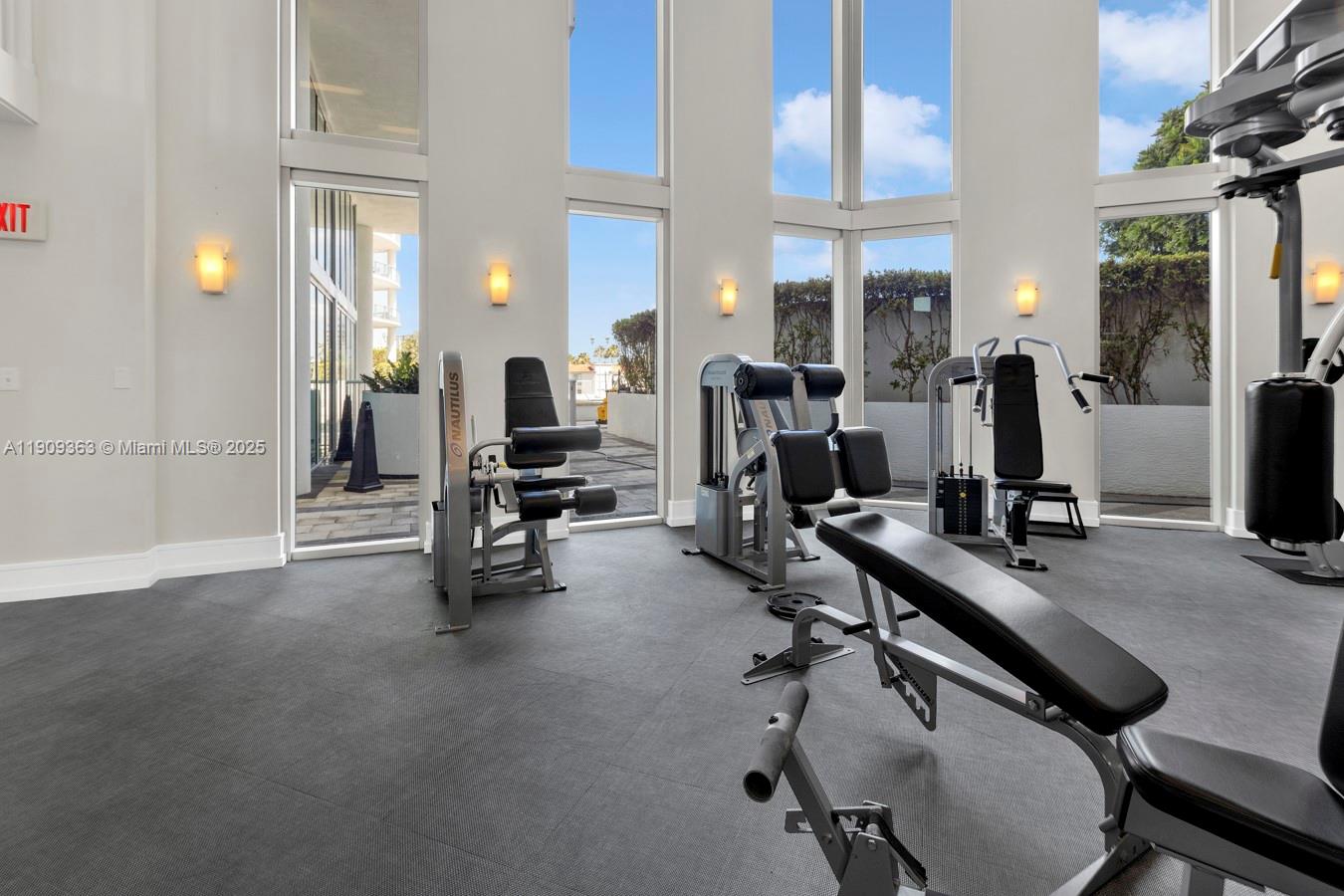 3131 Northeast 188th Street, Unit 21004 Aventura, FL 33180 - Photo 42 of 53 a view of a room with gym equipment