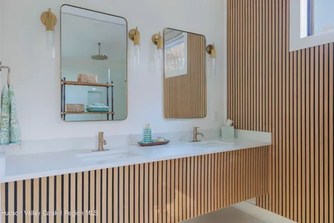 a view of a sink and a washer in a room