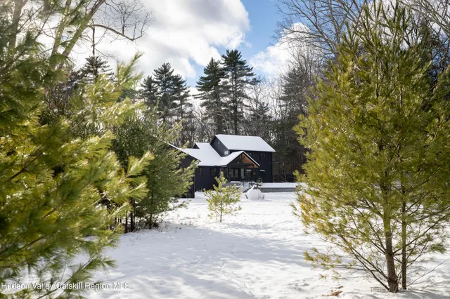 a view of a jacuzzi with a bench in a patio