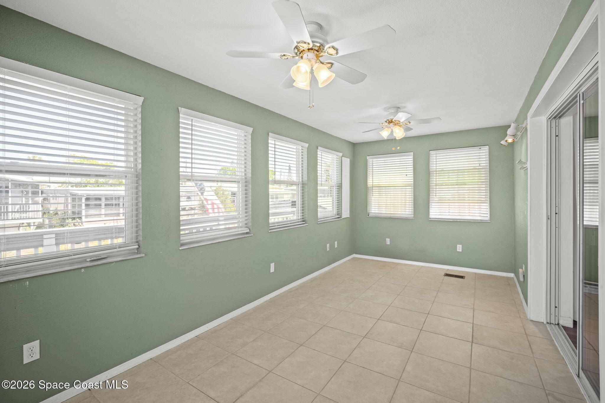 2966 Indian River Drive Northeast Palm Bay, FL 32905 - Photo 21 of 31 a view of an empty room with a window