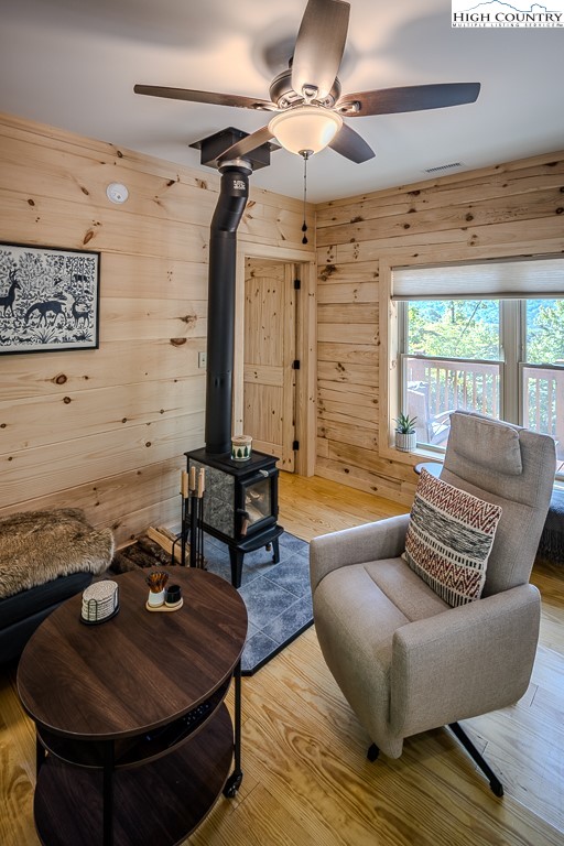 225 Oak Road Beech Mountain, NC 28604 - Photo 13 of 31 a living room with furniture and a chandelier