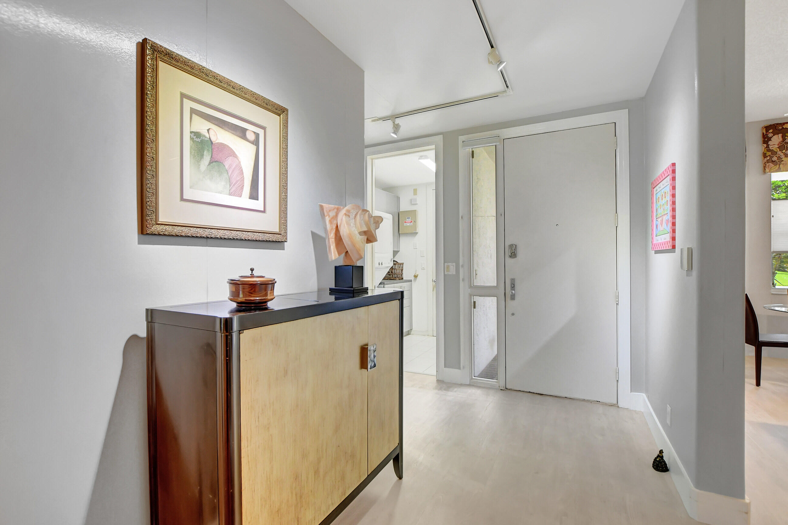 5801 Northwest 24th Avenue, Unit 1004 Boca Raton, FL 33496 - Photo 12 of 65 a view of kitchen and utility room