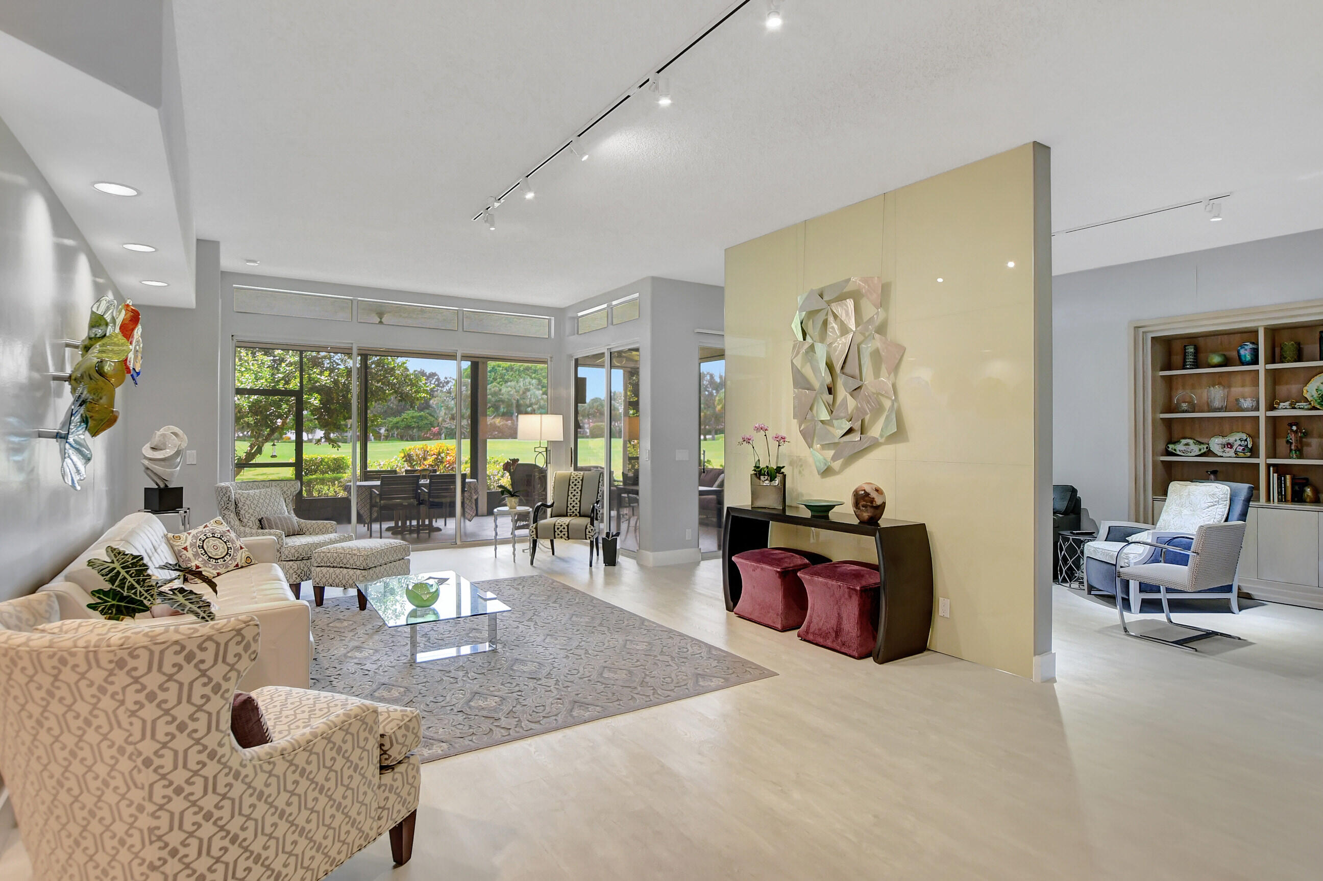 5801 Northwest 24th Avenue, Unit 1004 Boca Raton, FL 33496 - Photo 19 of 65 a living room with furniture or couch and a large window