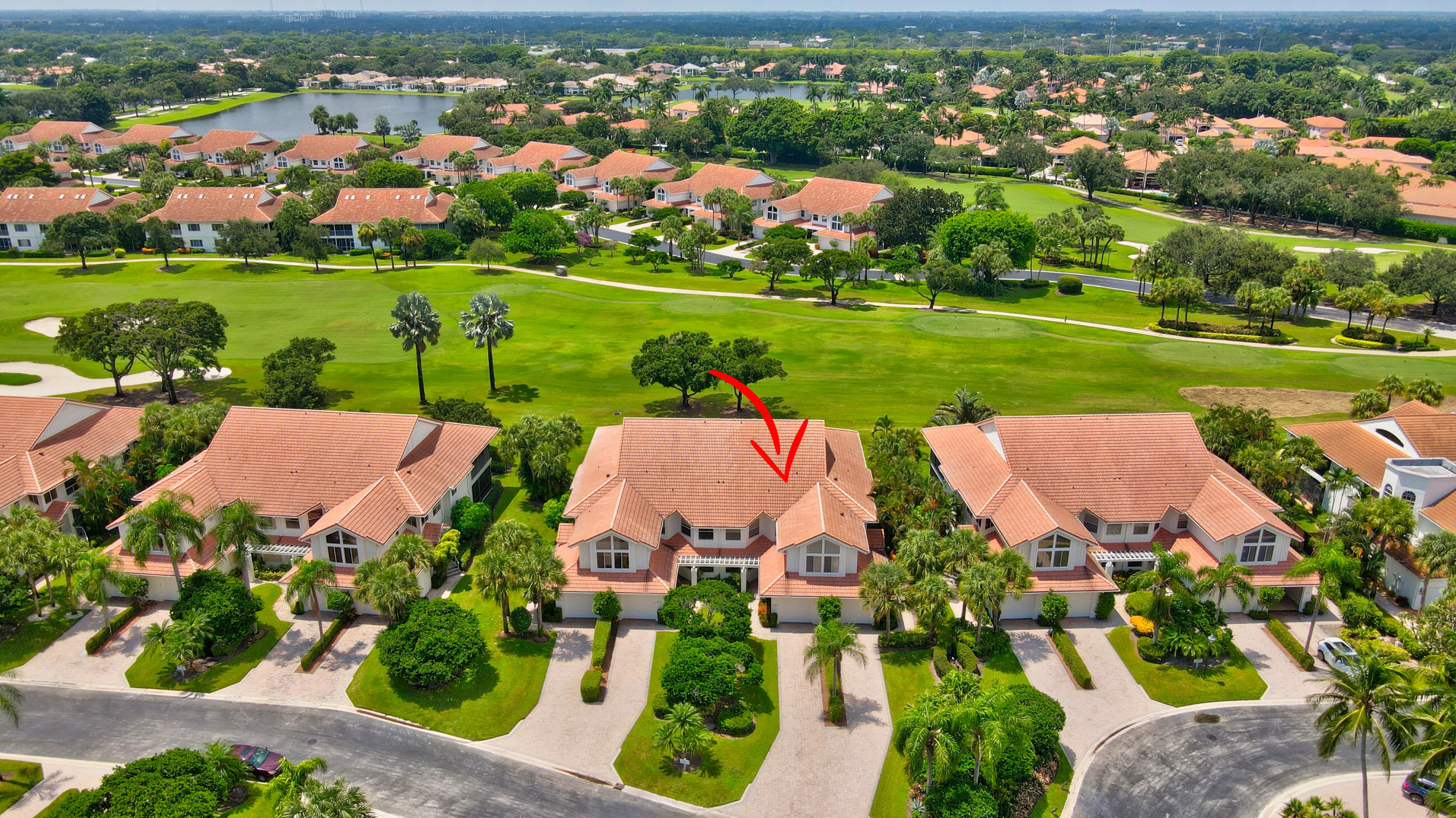 5801 Northwest 24th Avenue, Unit 1004 Boca Raton, FL 33496 - Photo 2 of 65 an aerial view of a house with outdoor space lake view and mountain view in back