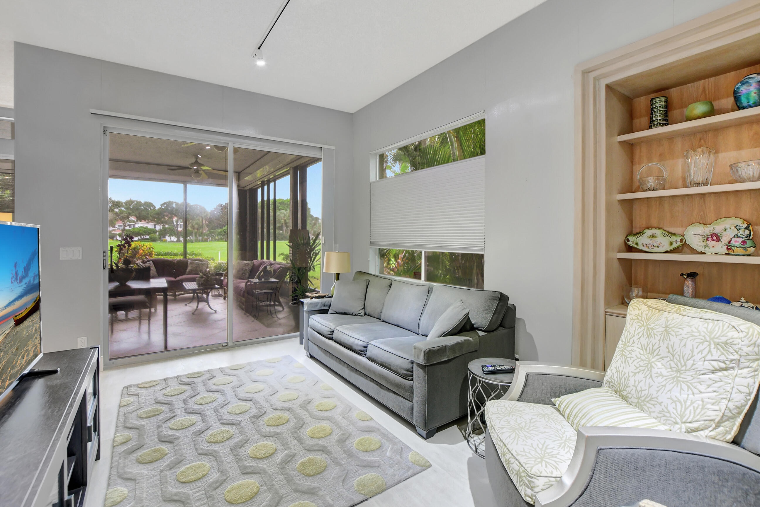 5801 Northwest 24th Avenue, Unit 1004 Boca Raton, FL 33496 - Photo 23 of 65 a living room with furniture and a large window