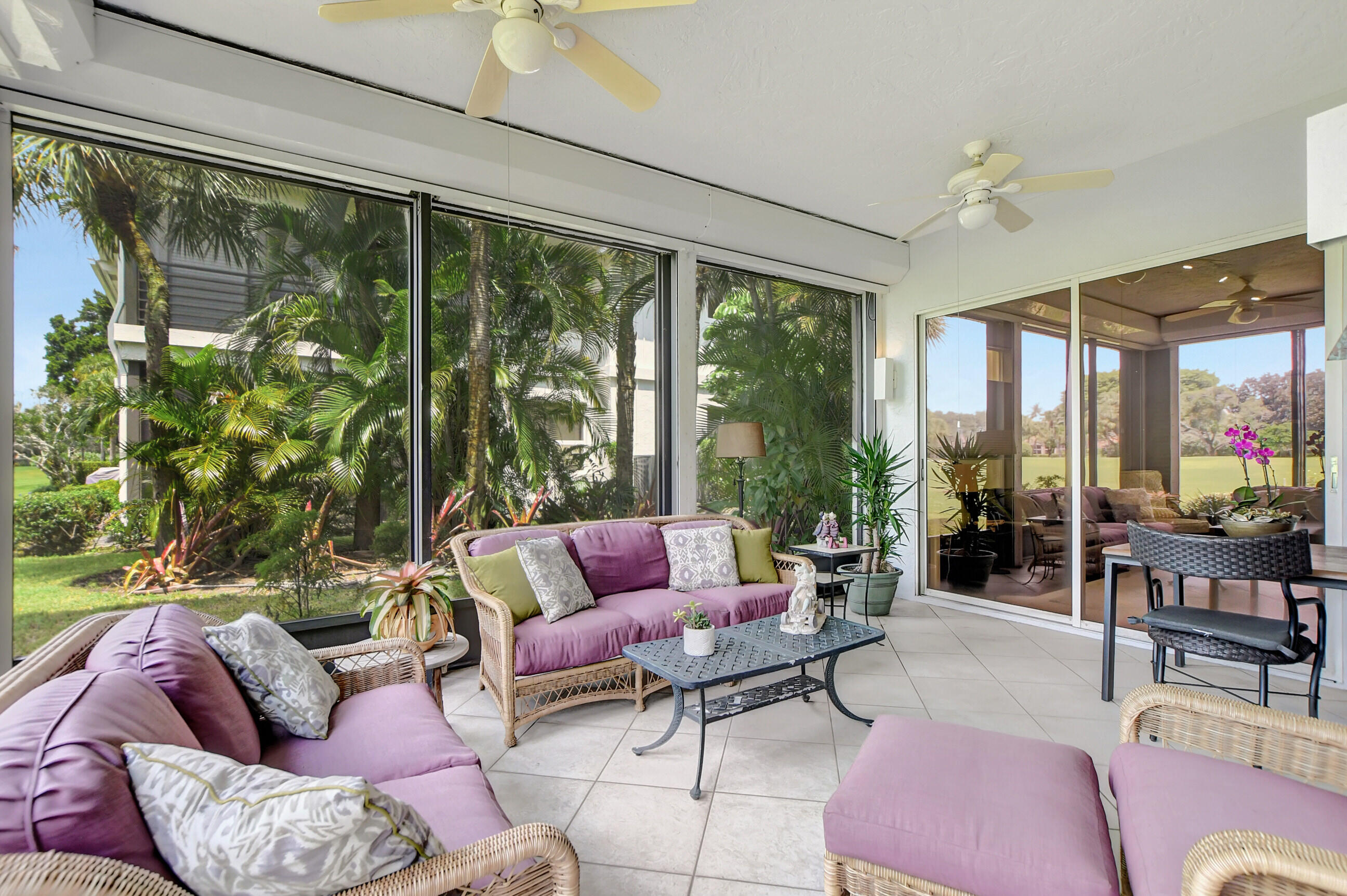 5801 Northwest 24th Avenue, Unit 1004 Boca Raton, FL 33496 - Photo 26 of 65 a living room with furniture and a floor to ceiling window