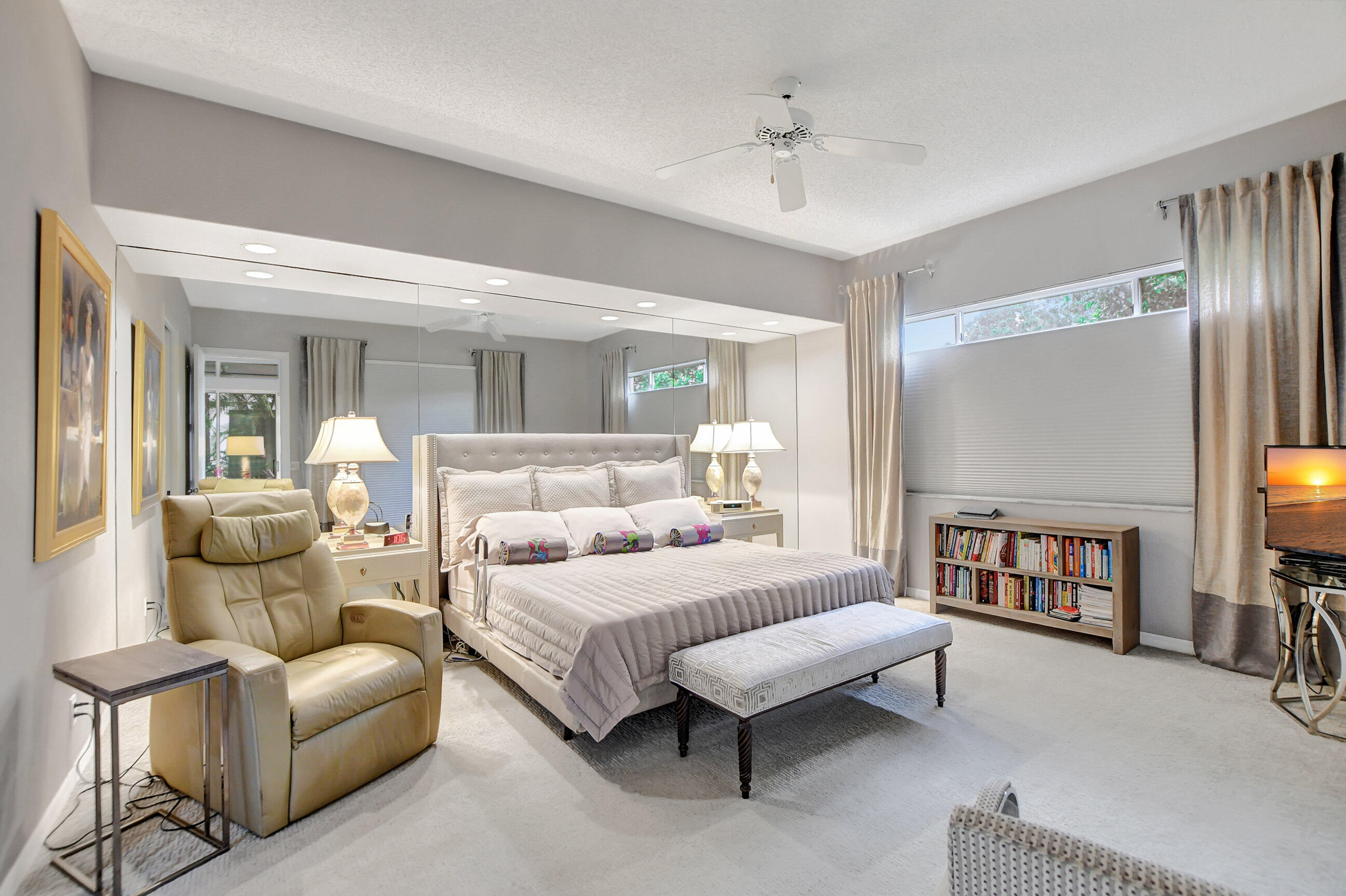 5801 Northwest 24th Avenue, Unit 1004 Boca Raton, FL 33496 - Photo 32 of 65 a bedroom with furniture and a couch