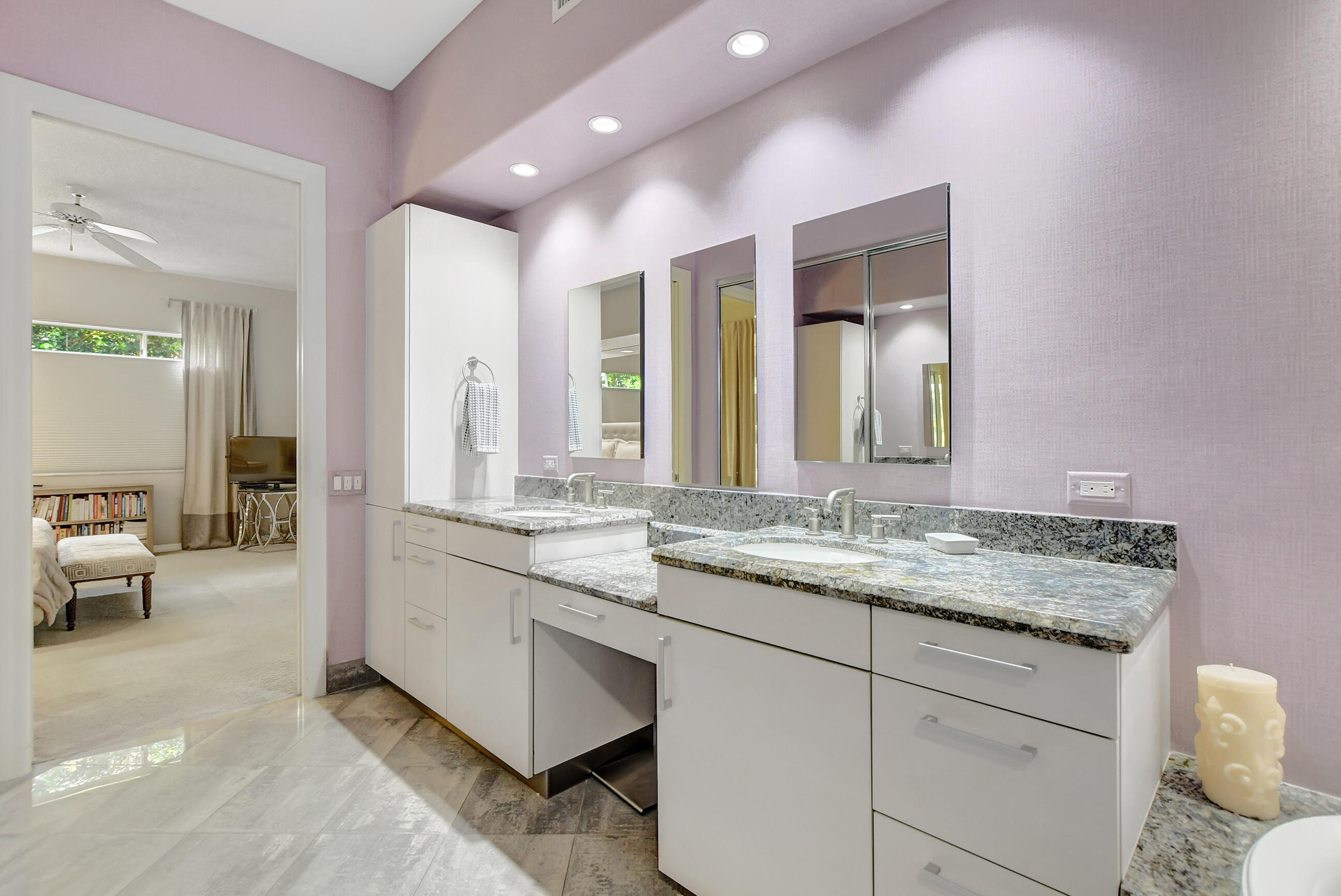 5801 Northwest 24th Avenue, Unit 1004 Boca Raton, FL 33496 - Photo 35 of 65 a bathroom with a granite countertop sink mirror and double
