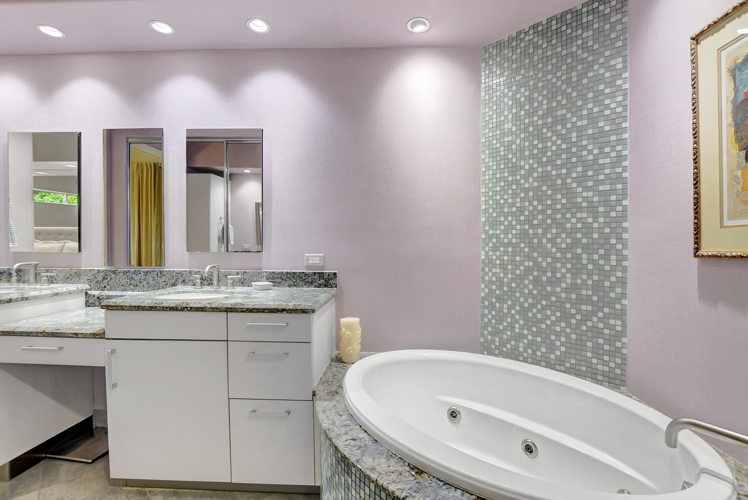 5801 Northwest 24th Avenue, Unit 1004 Boca Raton, FL 33496 - Photo 36 of 65 a bathroom with a granite countertop sink a toilet and mirror
