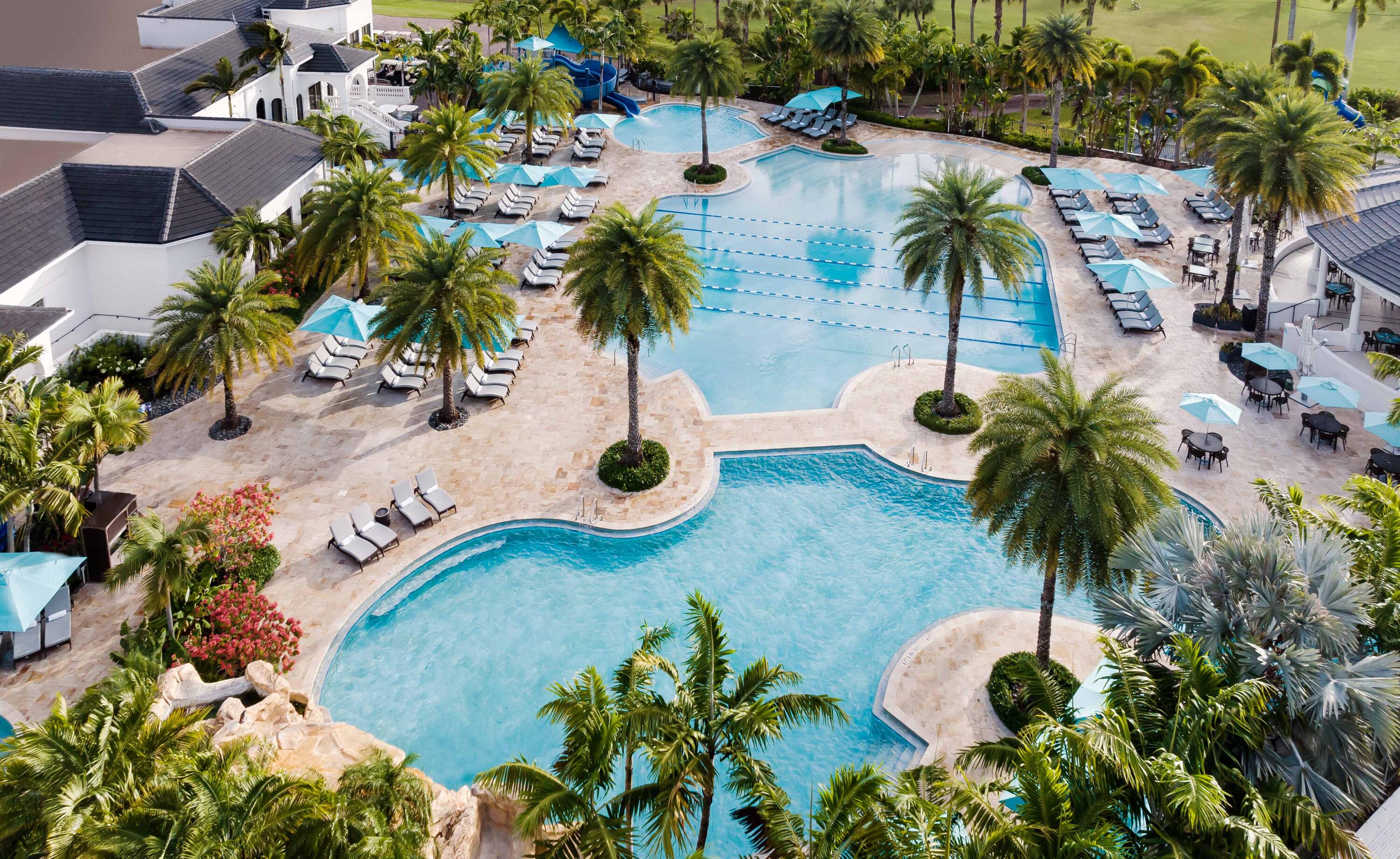 5801 Northwest 24th Avenue, Unit 1004 Boca Raton, FL 33496 - Photo 47 of 65 POOL AERIAL