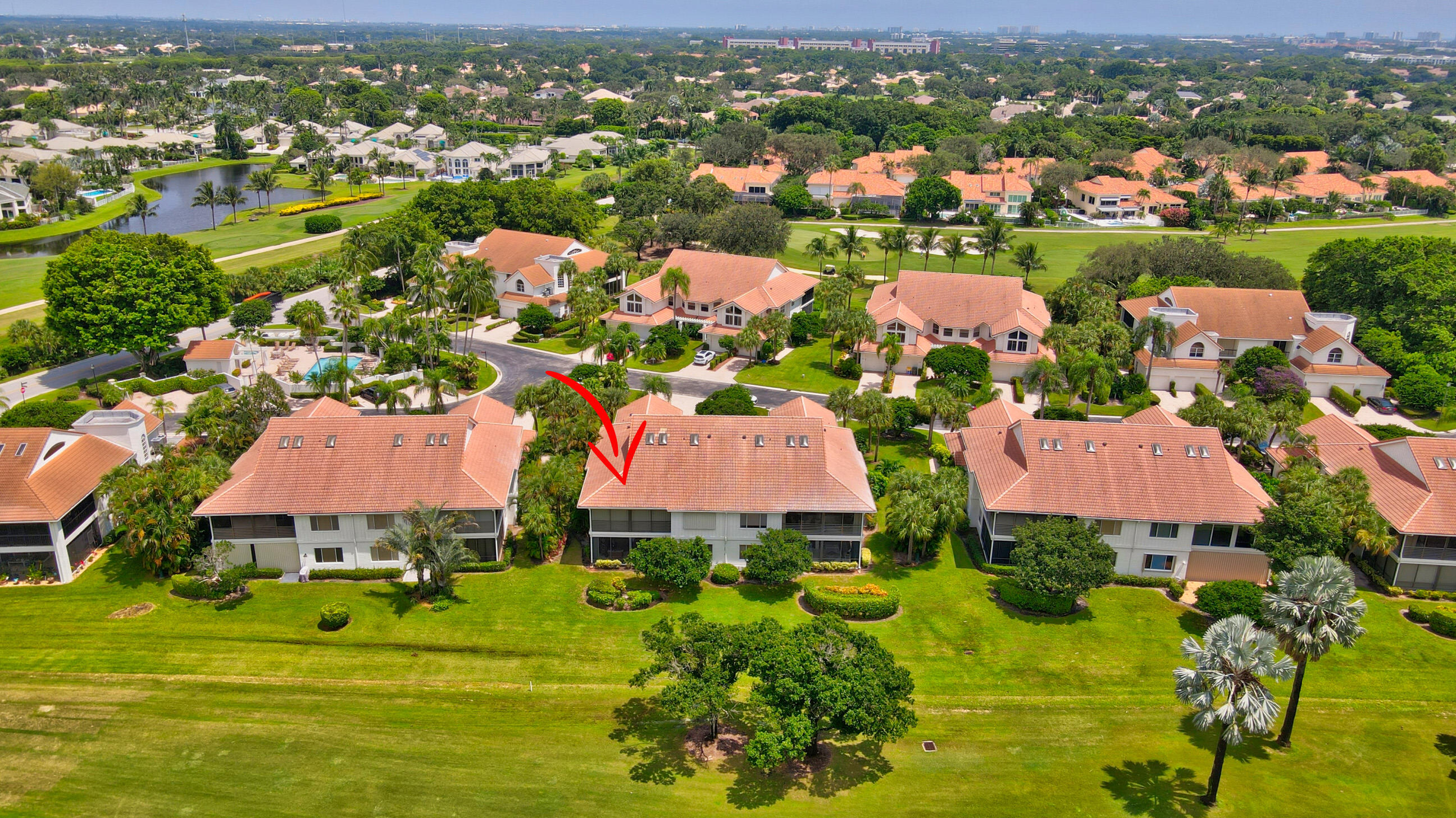 5801 Northwest 24th Avenue, Unit 1004 Boca Raton, FL 33496 - Photo 6 of 65 an aerial view of residential houses with outdoor space