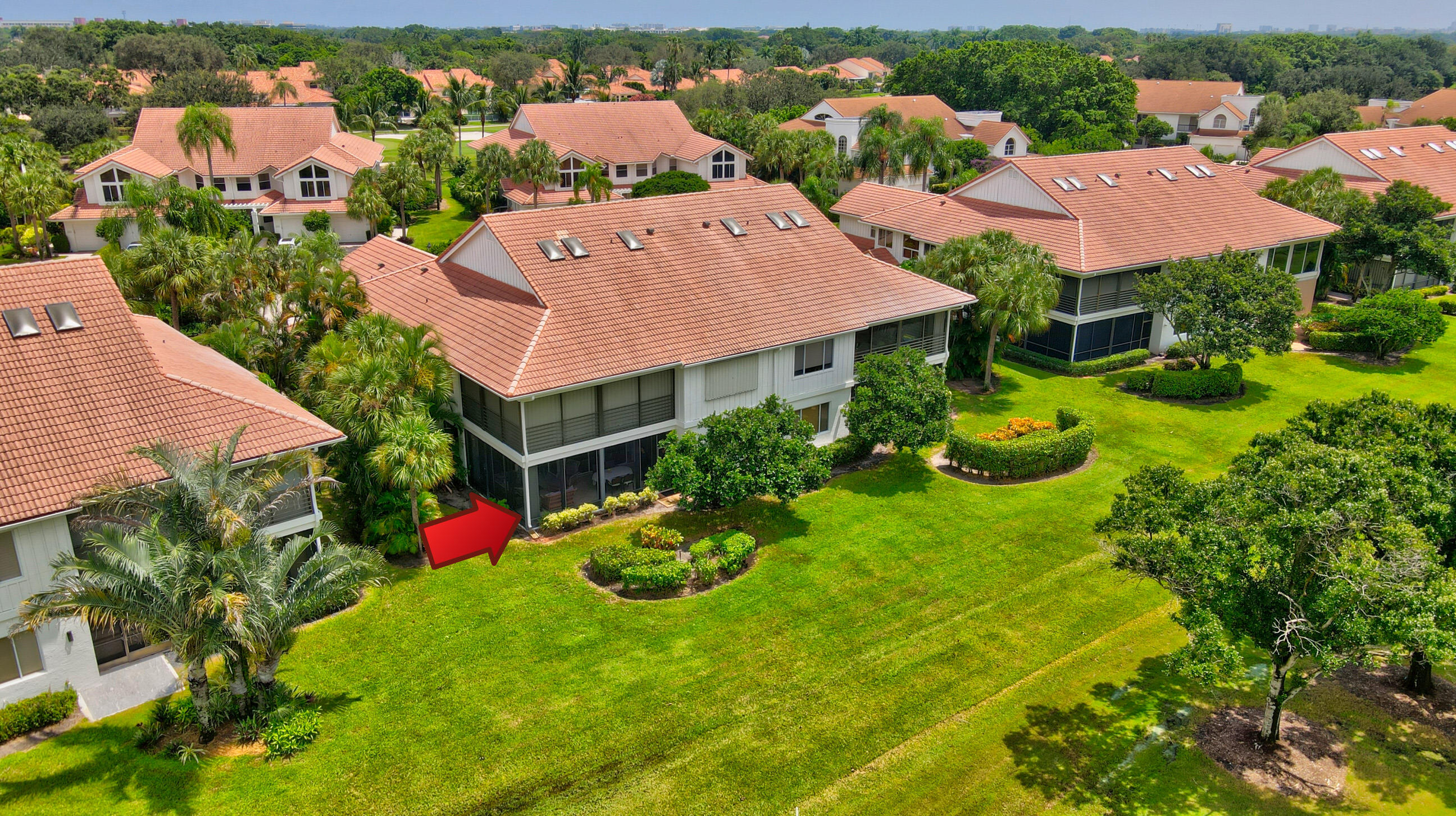 5801 Northwest 24th Avenue, Unit 1004 Boca Raton, FL 33496 - Photo 7 of 65 an aerial view of a house with yard