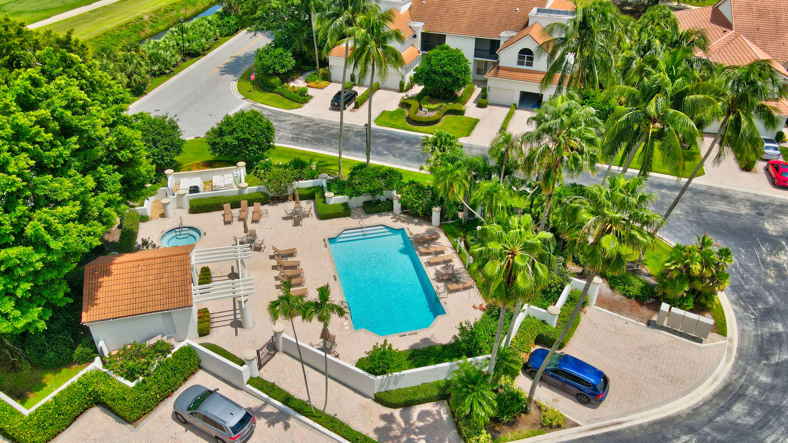 5801 Northwest 24th Avenue, Unit 1004 Boca Raton, FL 33496 - Photo 9 of 65 an aerial view of a house with garden space and lake view