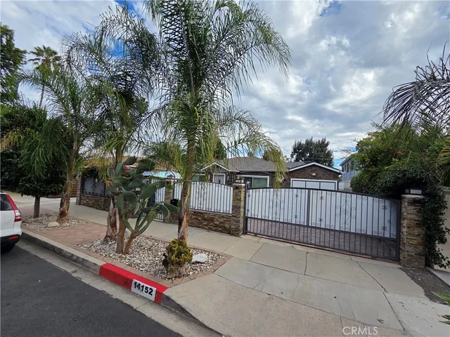 a view of backyard space and deck