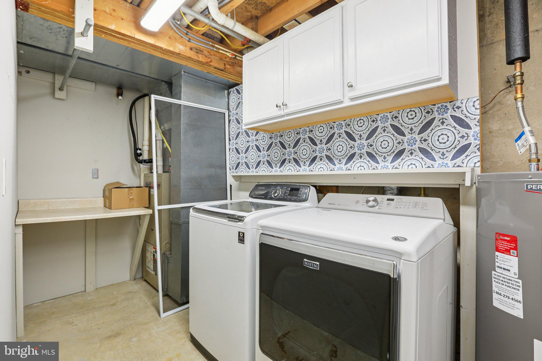 4642 Marksman Court Hampstead, MD 21074 - Photo 24 of 35 a utility room with dryer and washer