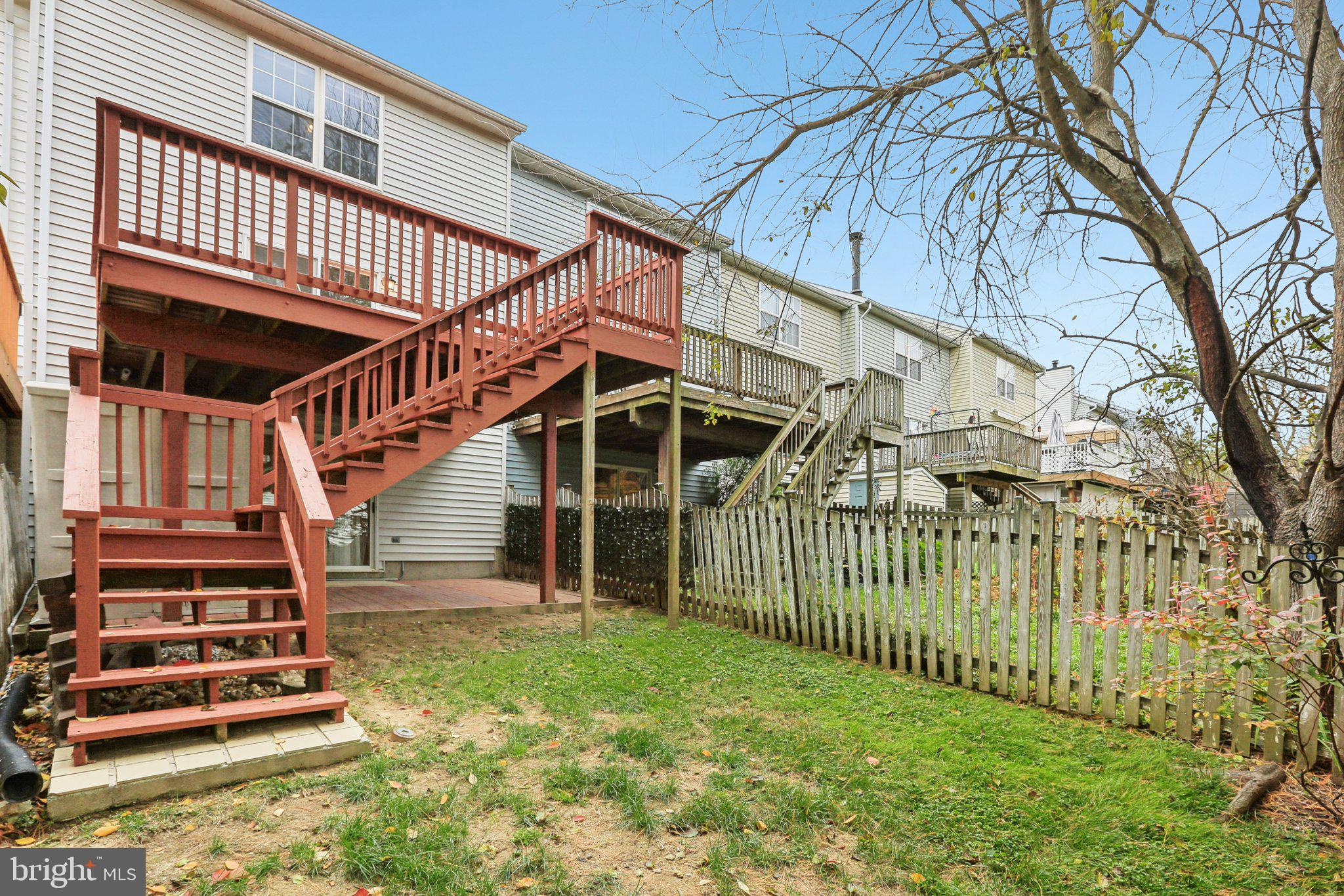 4642 Marksman Court Hampstead, MD 21074 - Photo 29 of 35 a view of entryway with wooden stairs