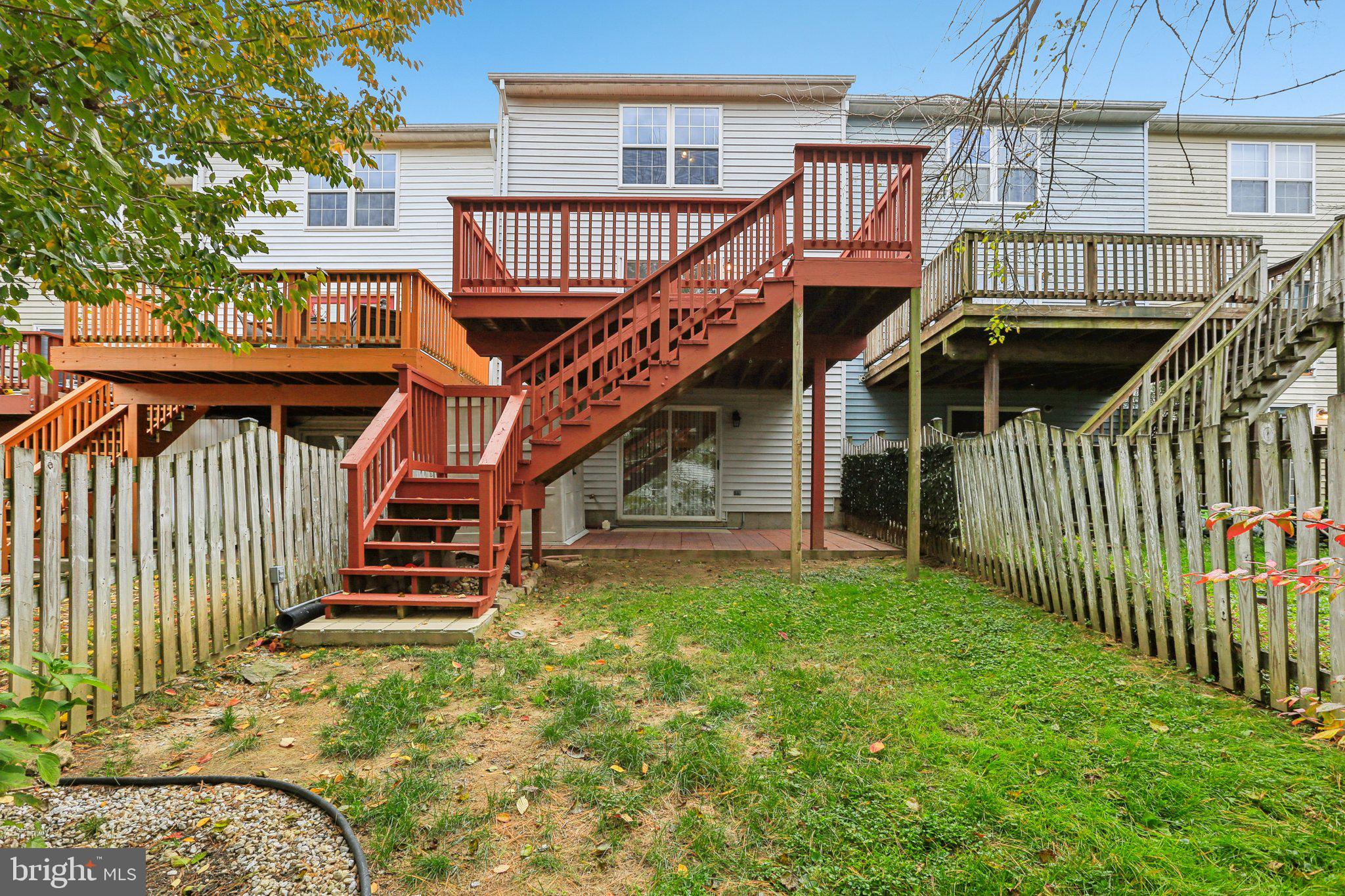 4642 Marksman Court Hampstead, MD 21074 - Photo 31 of 35 a view of a house with backyard and deck