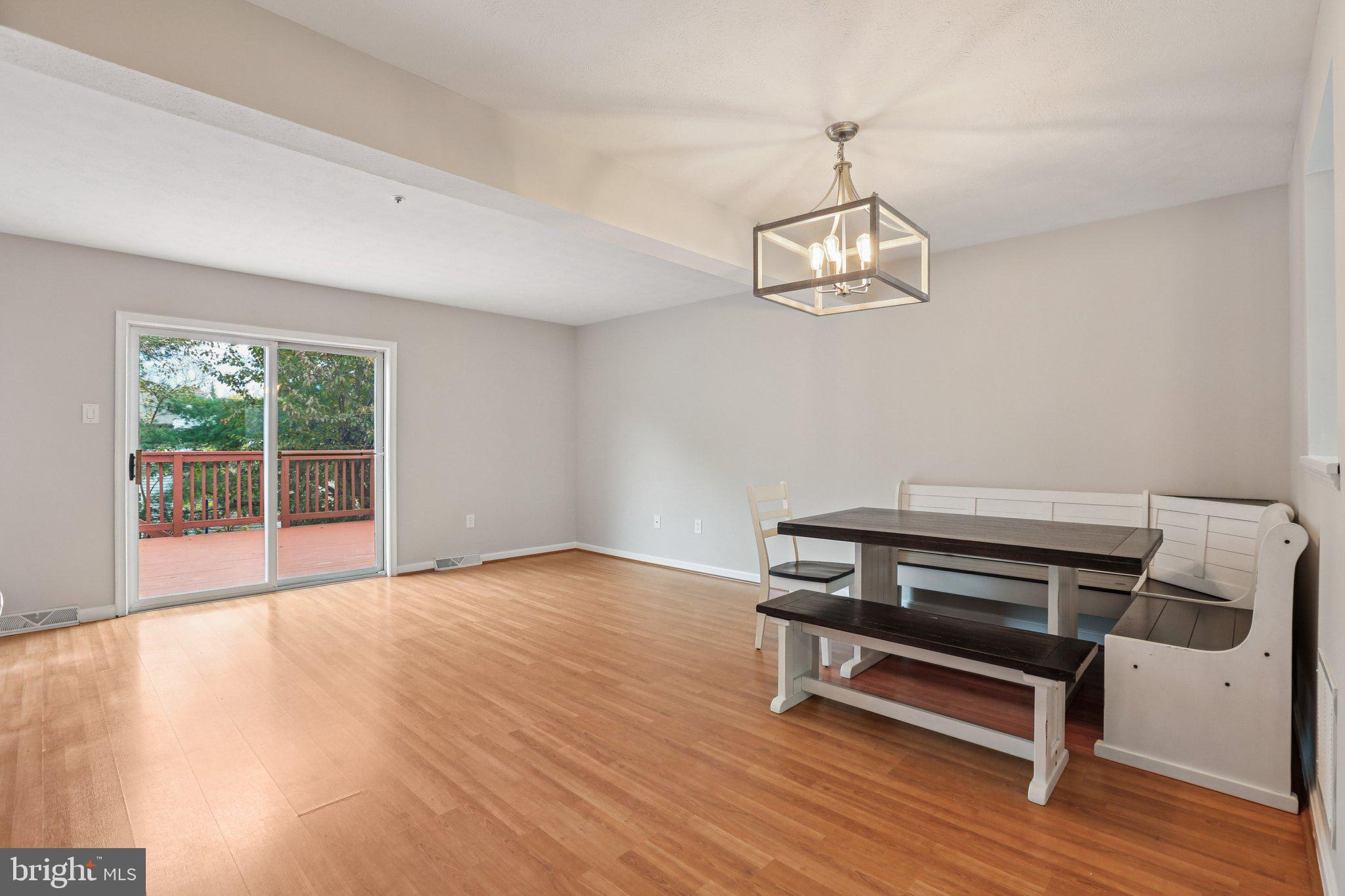 4642 Marksman Court Hampstead, MD 21074 - Photo 5 of 35 a view of room with wooden floor and window
