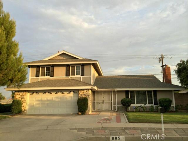 885 East Margarita Road Rialto, CA 92376 - Photo 1 of 1 a front view of a house with garage