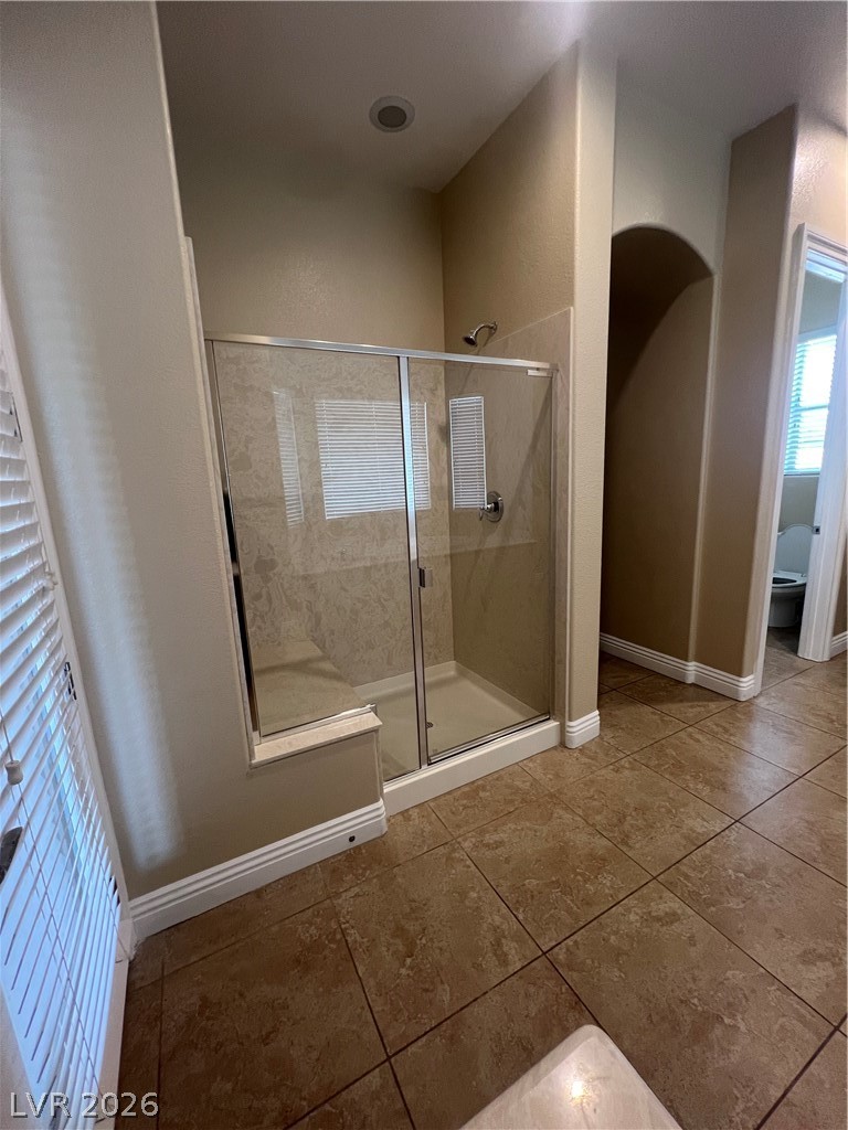 Undisclosed Address Las Vegas, NV 89129 - Photo 21 of 33 Bathroom featuring a stall shower and light tile patterned floors