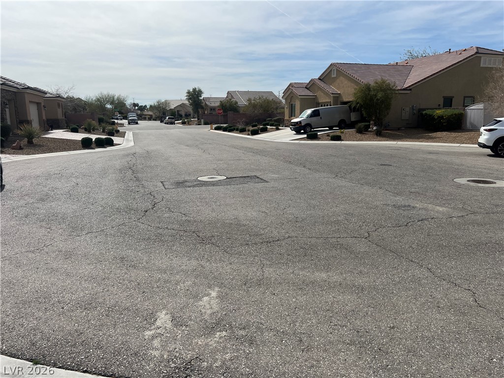 Undisclosed Address Las Vegas, NV 89129 - Photo 9 of 33 View of asphalt street with a residential view