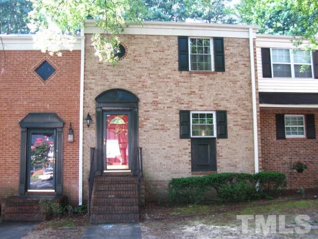 6455 New Market Way Raleigh, NC 27615 - Photo 1 of 18 a front view of a house with yard