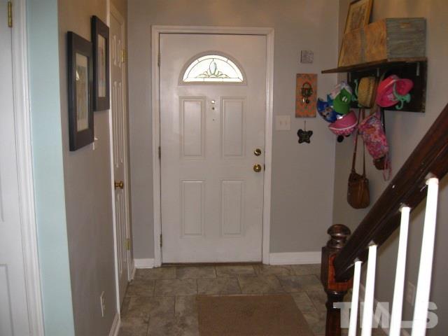 6455 New Market Way Raleigh, NC 27615 - Photo 2 of 18 a view of entryway with wooden floor