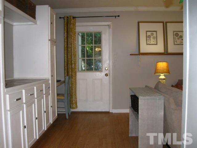 6455 New Market Way Raleigh, NC 27615 - Photo 4 of 18 a view of hallway with mirror