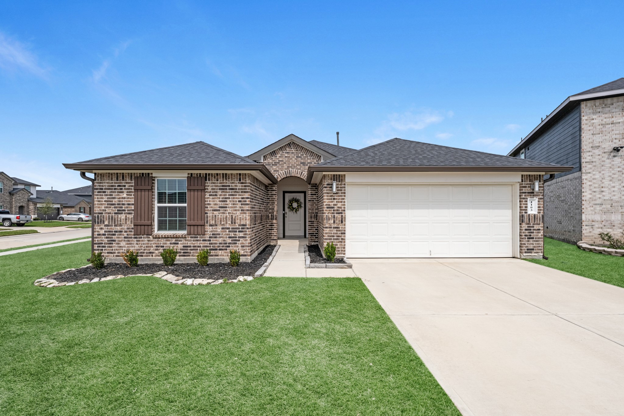 1103 Texel Street Rosharon, TX 77583 - Photo 1 of 33 a front view of a house with a yard