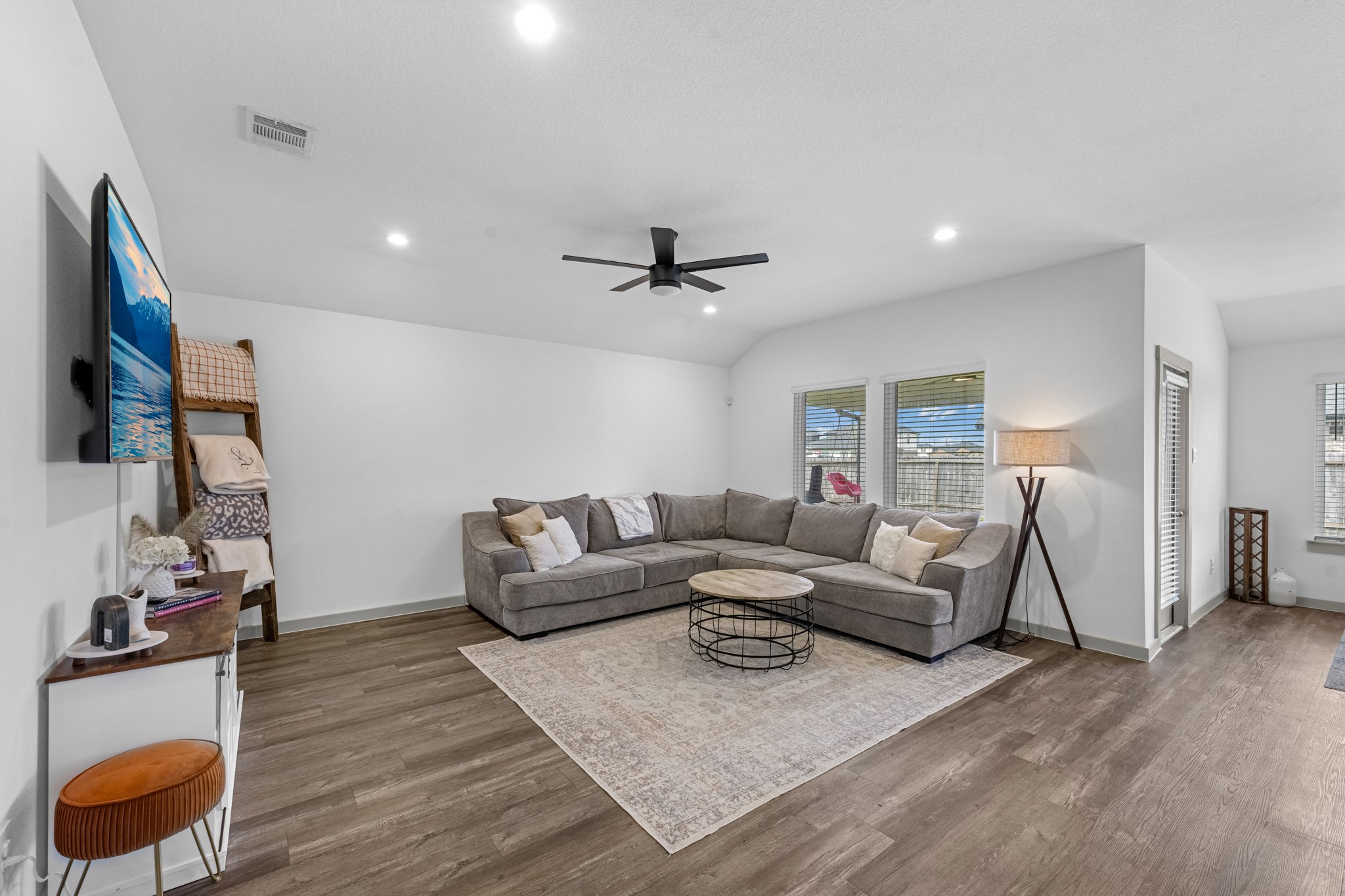 1103 Texel Street Rosharon, TX 77583 - Photo 3 of 33 a living room with furniture and a flat screen tv