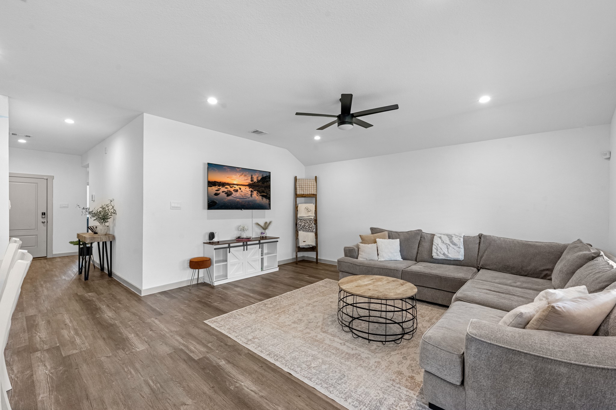 1103 Texel Street Rosharon, TX 77583 - Photo 5 of 33 a living room with furniture and a flat screen tv