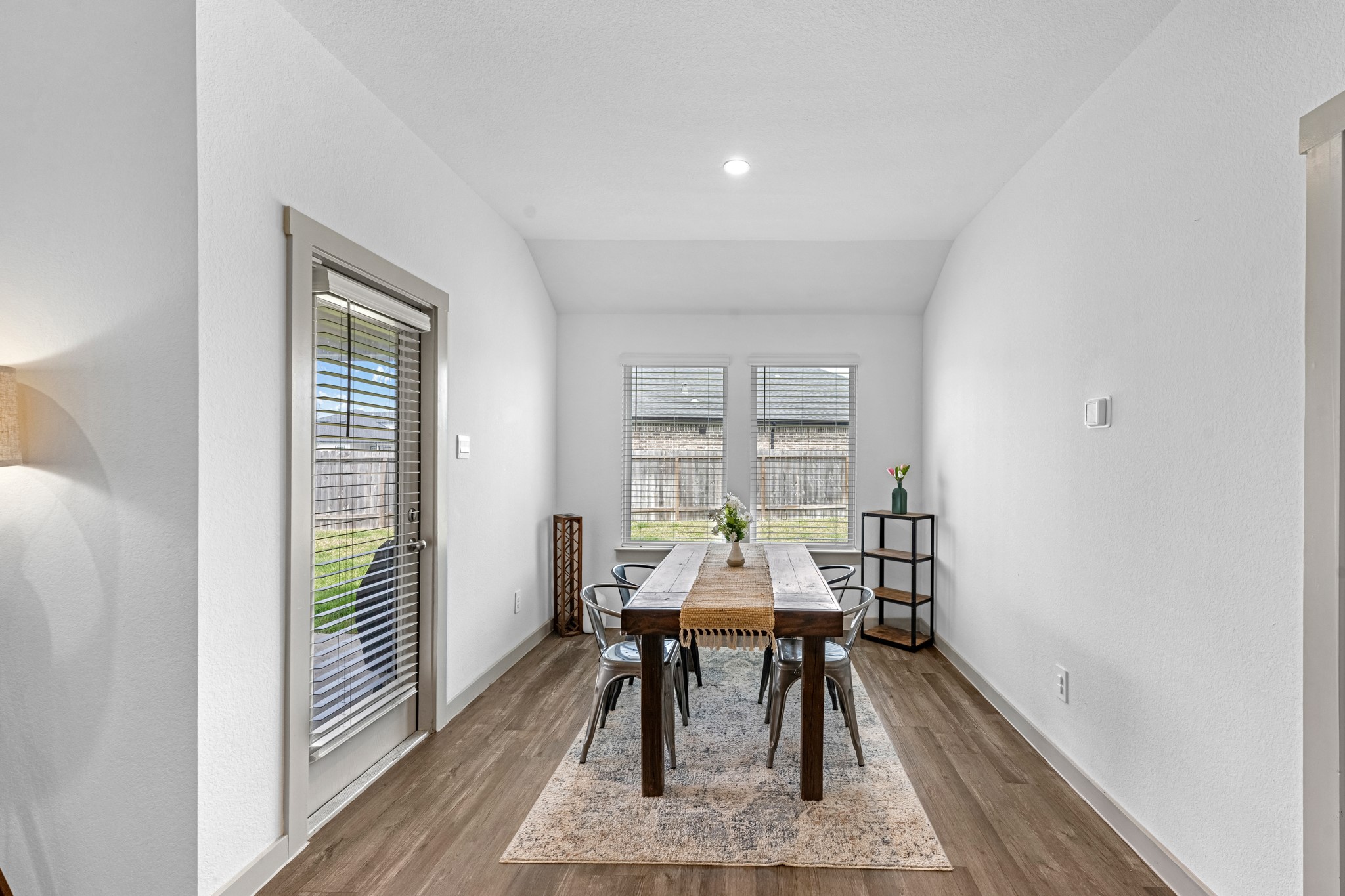 1103 Texel Street Rosharon, TX 77583 - Photo 9 of 33 a view of a dining room with furniture and wooden floor