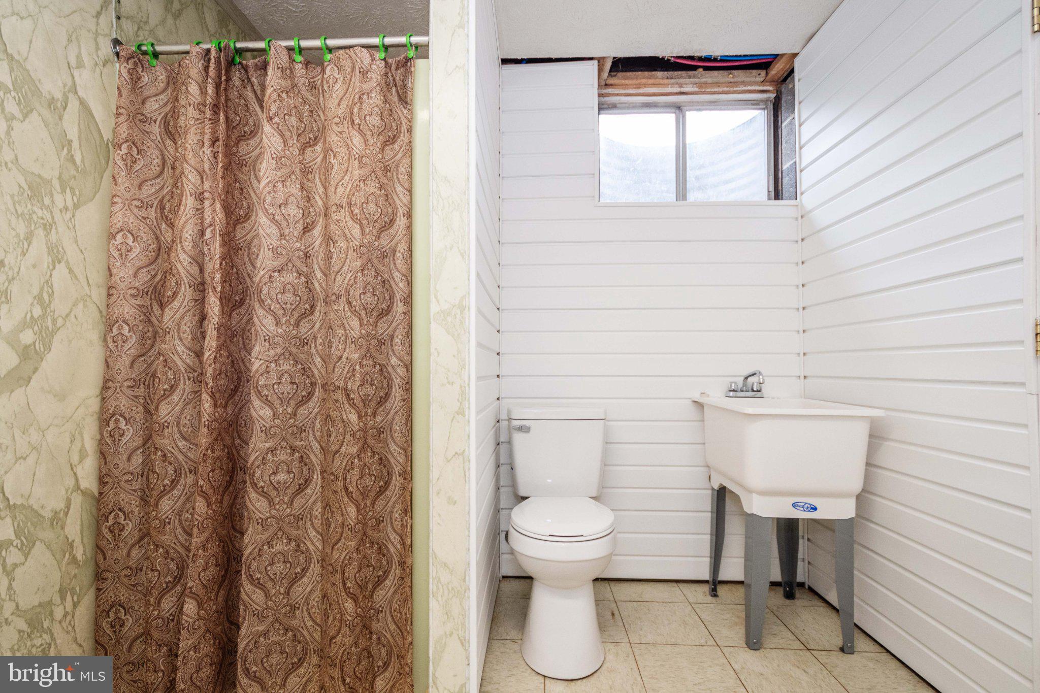 2155 Jennings Road Grantsville, MD 21536 - Photo 35 of 39 Functional bathroom with natural light.