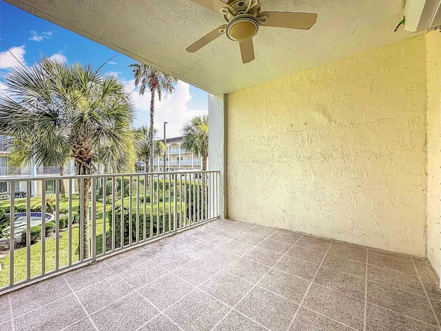 a aerial view of a house with a garden and plants