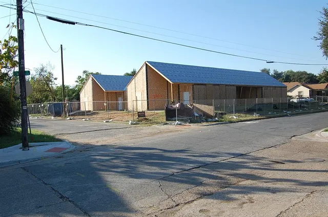 a car parked in front of a house