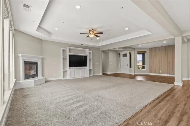 a large kitchen with stainless steel appliances granite countertop a large counter top and oven