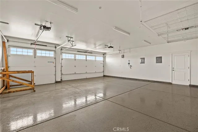 a front view of a house with a garage